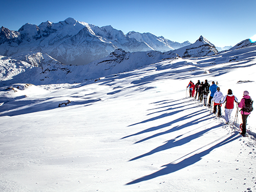 snowshoes walk in megeve with a guide